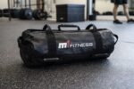 Capa para Power Bag M1 Fitness 20kg em nylon 420 em ambiente de academia